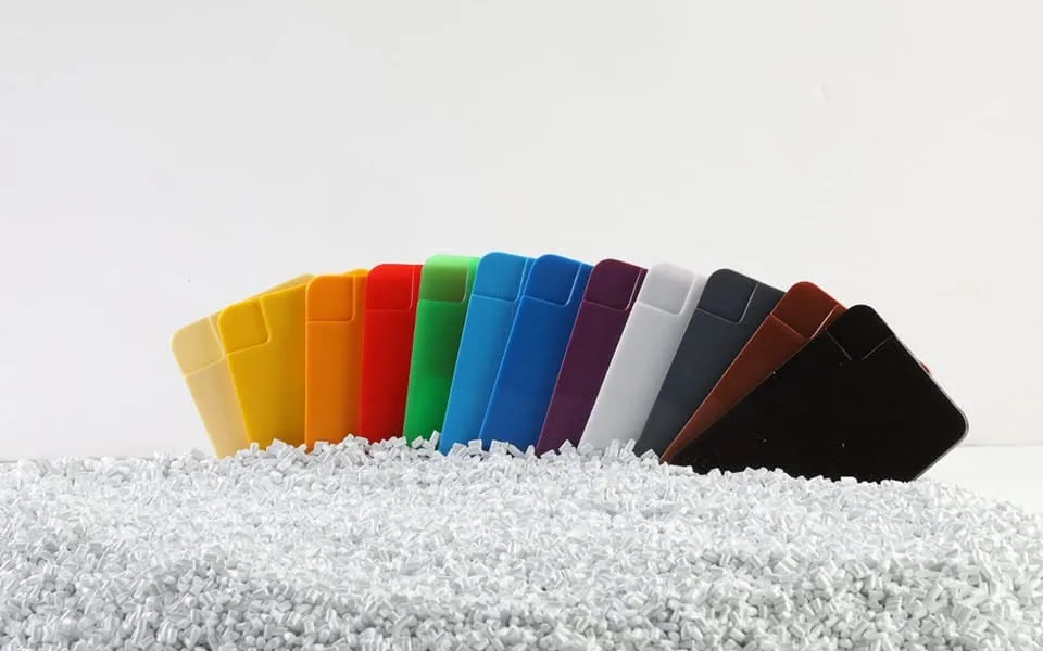 Colored plastic granules in glass bowls